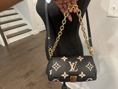 LOUIS VUITTON Leather Empreinte Monogram Favorite MM bag Bi Color