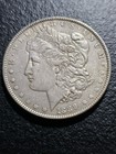 AU 1889 MORGAN SILVER DOLLAR — photo 1
