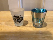 Partia 2 Pamiątkowe kieliszki zewnętrzne OBX NC jedno opalizujące niebieskie, jedno matowe