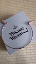 Accessoire tête de lit Vivienne Westwood orbe corne diadème or rose sans boîte