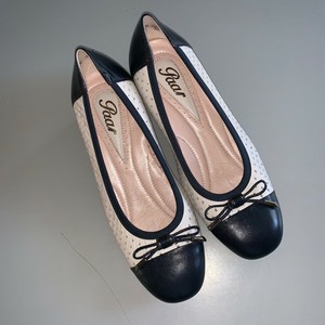 navy and white pumps