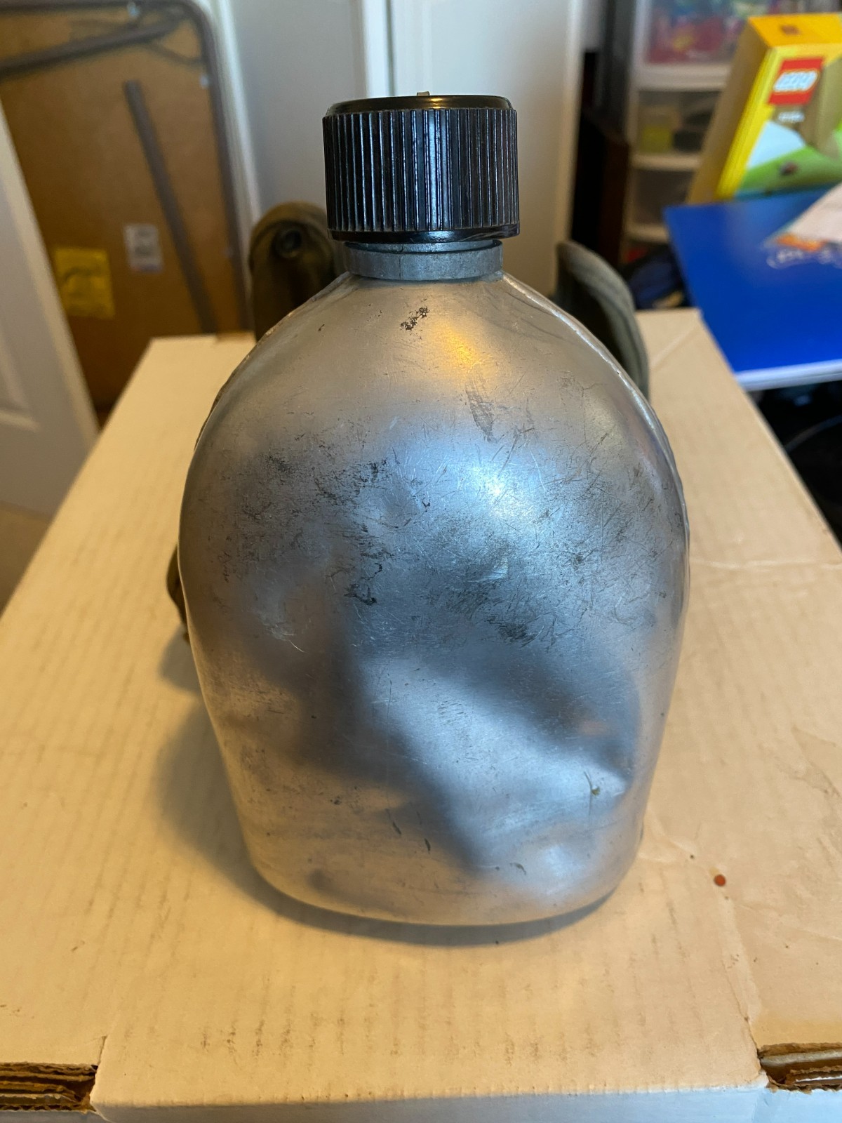 Vintage military aluminum dented canteen w/ green canvas cover unmarked