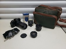 Nikon EM 35mm SLR Film Camera  DeJUR 135mm Nikon 50mm DeJur 35mm Flash  Case