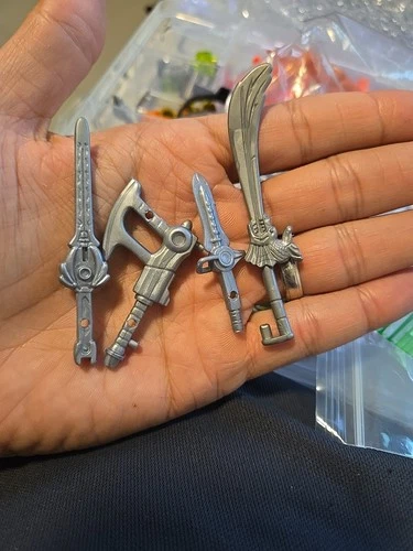 Lot of 104 Vintage Mighty Morphin Power Rangers Weapons/Accessories