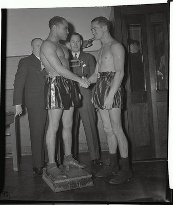 Champion Henry Armstrong Fritzie Zivic weighing their 15 round we- 1940 Photo