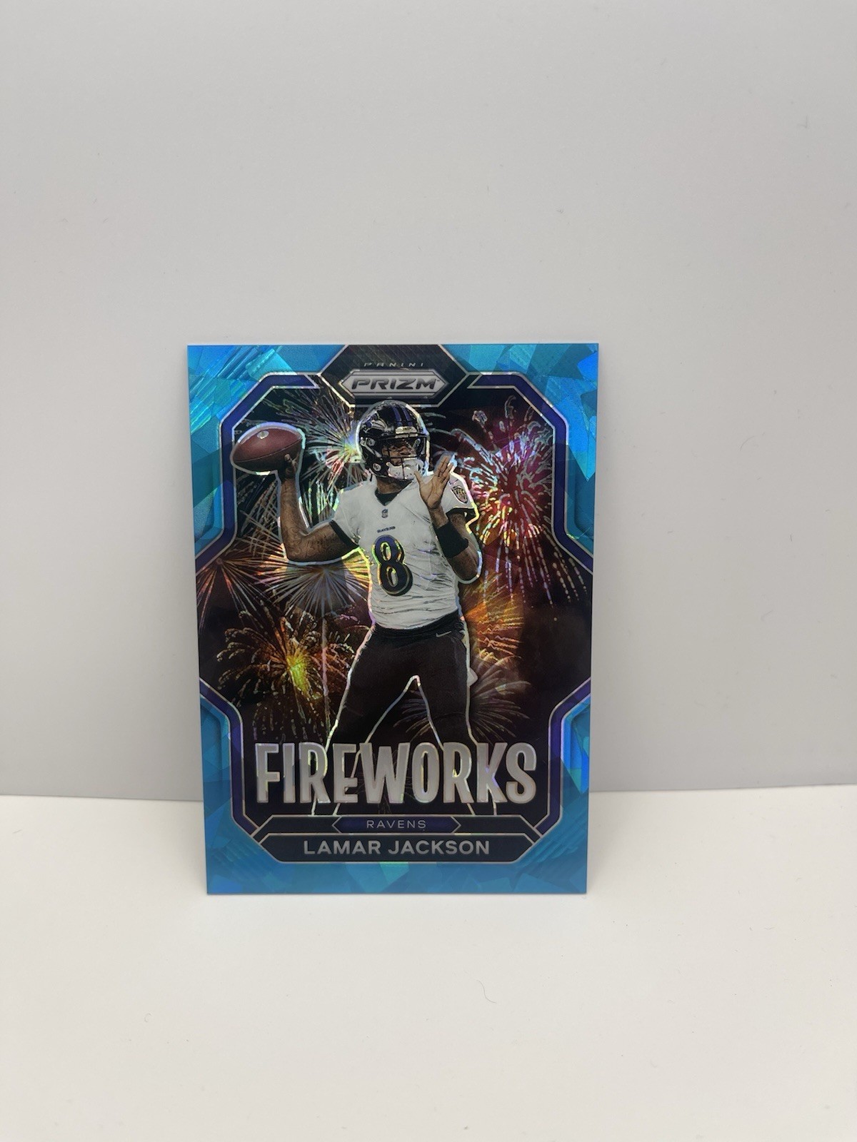 2022 Panini Prizm - Fireworks Lamar Jackson #F-7 Blue Ice Prizm /99