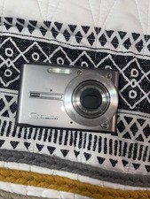 Sleek silver Casio Exilim EX-s500 digital camera with optical zoom (parts only)