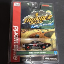 Auto World Thunderjet 1962 Chevrolet Bel Air Black  Red HO Scale Slot Car
