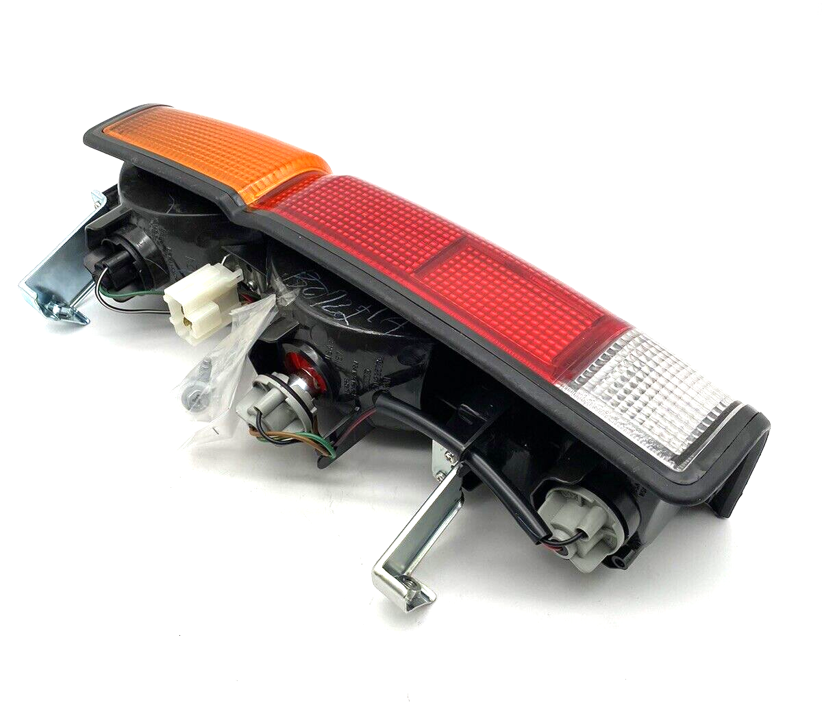 Faro Posteriore Destro Per Nissan KING CAB (1986-1991) - Ricambio B655023G10, Colore Bianco/Arancio/Rosso, 40 Cm