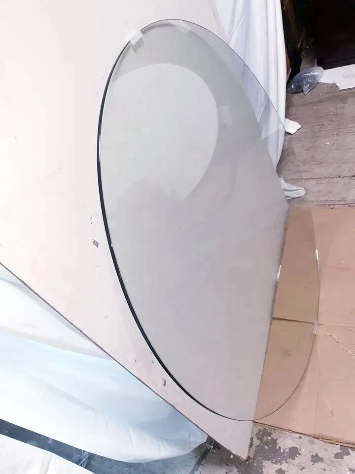 Mesa de comedor redonda de vidrio Moe's Redondo con base de acero inoxidable 48 pulgadas Foto 2 de 4