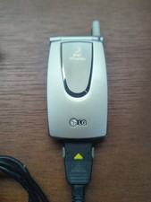 LG G4011 - Silver  AT T  Cellular Flip Phone With Charging Cord - Works 