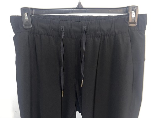 Pantaloni Lululemon Keep Moving taglia 8 Luxtreme neri joggers vita alta abbigliamento attivo - Foto 2 di 7