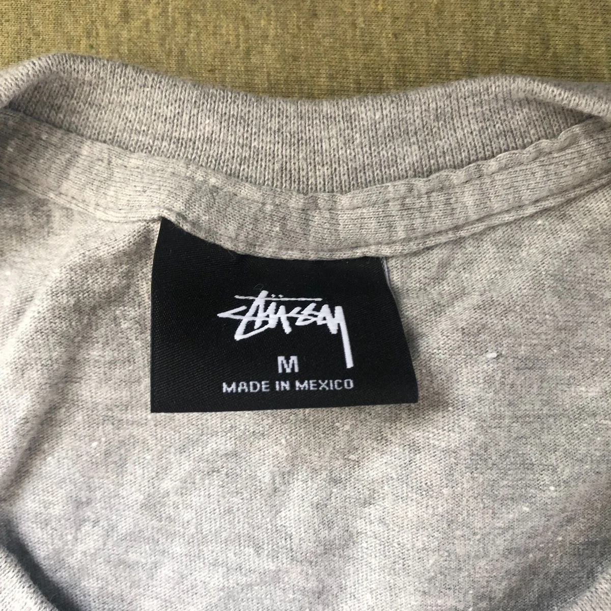statue tee stussy