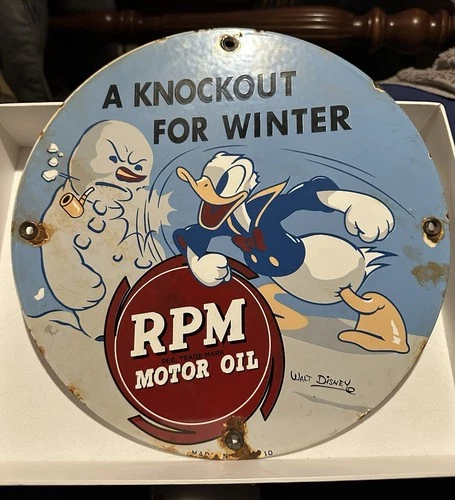 Vintage RPM Motor Oil A Knockout For Winter Porcelain Sign 1940 Walt Disney.