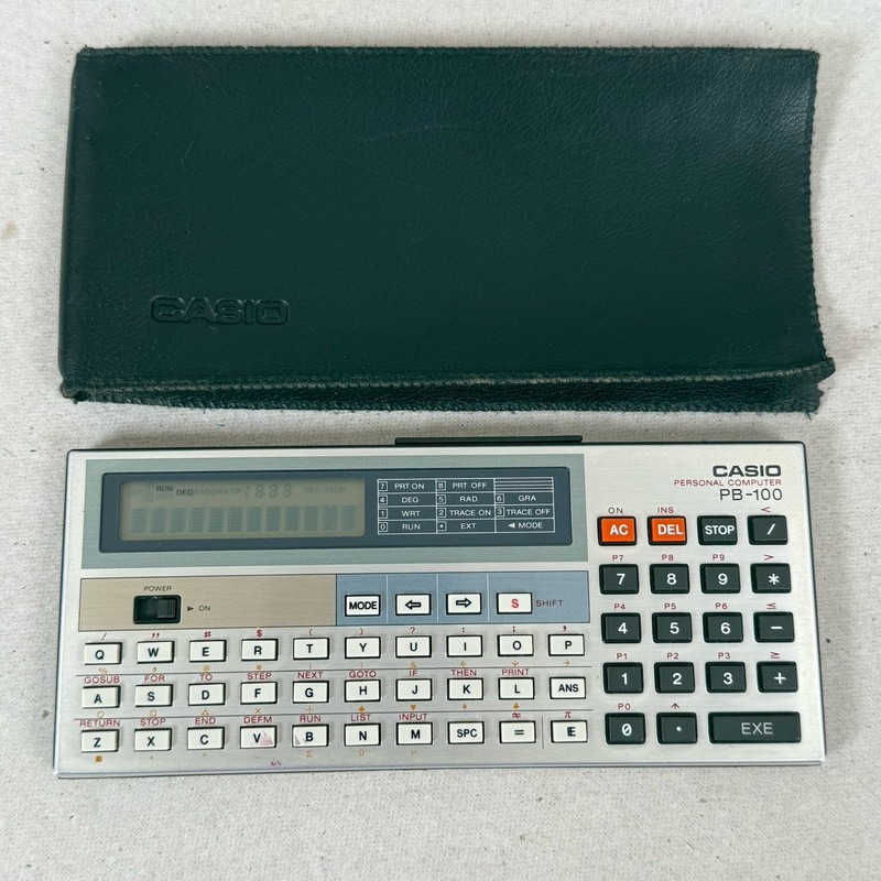 CASIO PB-100 Personal Pocket Computer With Case and New Batteries (M)