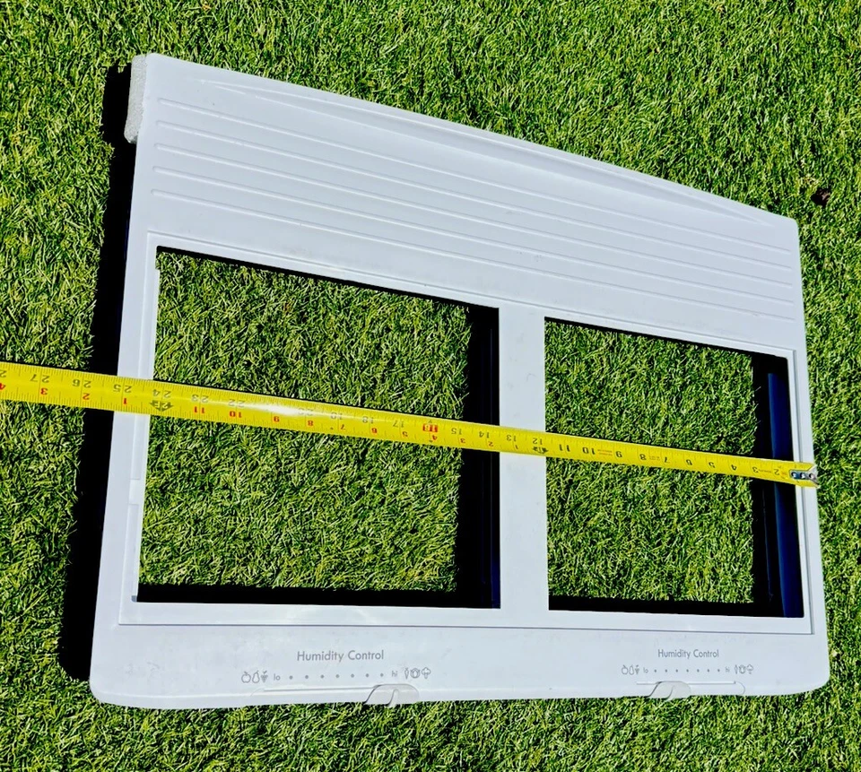 Marco de cubierta para refrigerador Kenmore # 3011492300 del modelo # 111.60512912 Foto 2 de 4