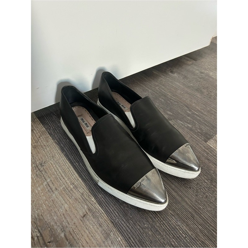 Miu Miu Black Slip-On Sneakers with Metallic Silver Cap Toe