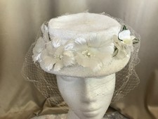 Vintage white floral theme wedding hat with small brim and short veil