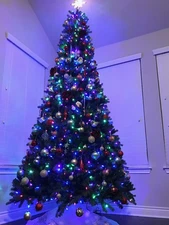 7-10 ft. LED Pre-Lit Multi-Color Adjustable Rising Spruce Christmas Tree Artific