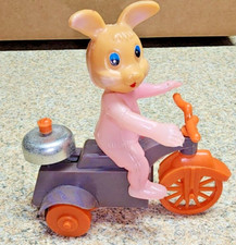 Vintage Easter Unlimited Wind-up Bunny on Tricycle Scooter. Works Great.