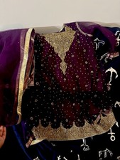 Purple Embroidered Net Salwar Kameez with Gold Detailing  Matching Dupatta