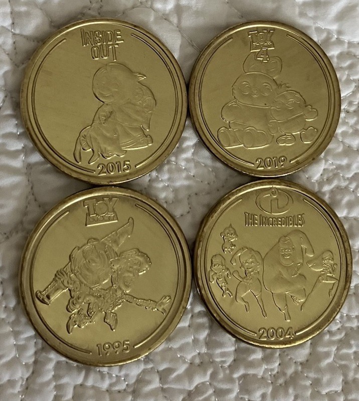 Pixar Fest Collectible Coins Set Of 4 Coins. Toy Story, Inside Out, Incredibles