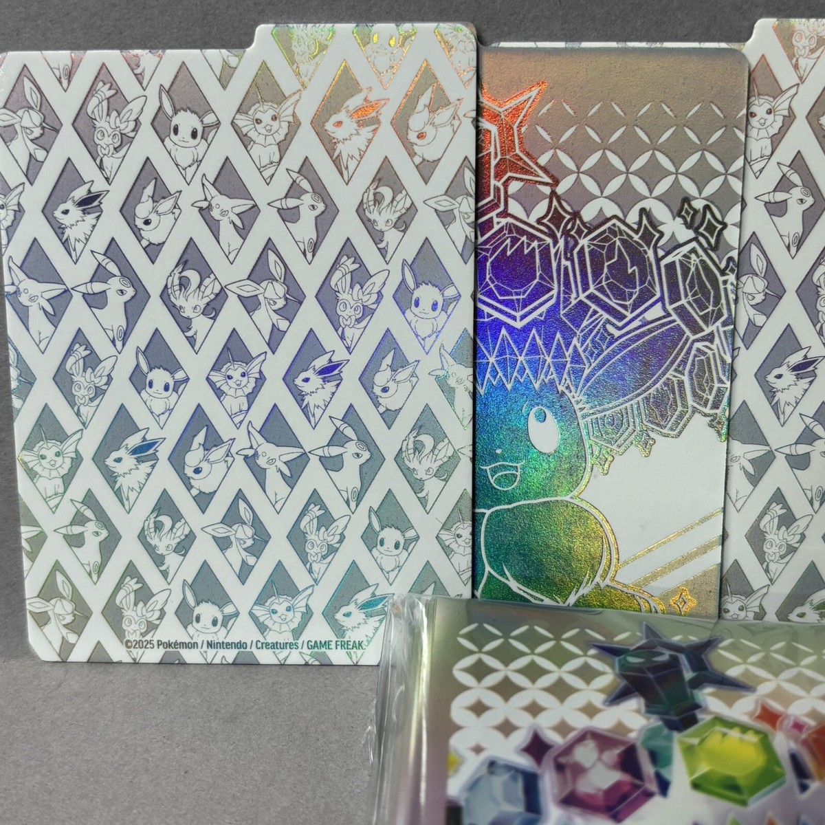 eevee prismatic card sleeves Pokemon Prismatic Evolutions Eevee Card Sleeves [65 Count] main image 0
