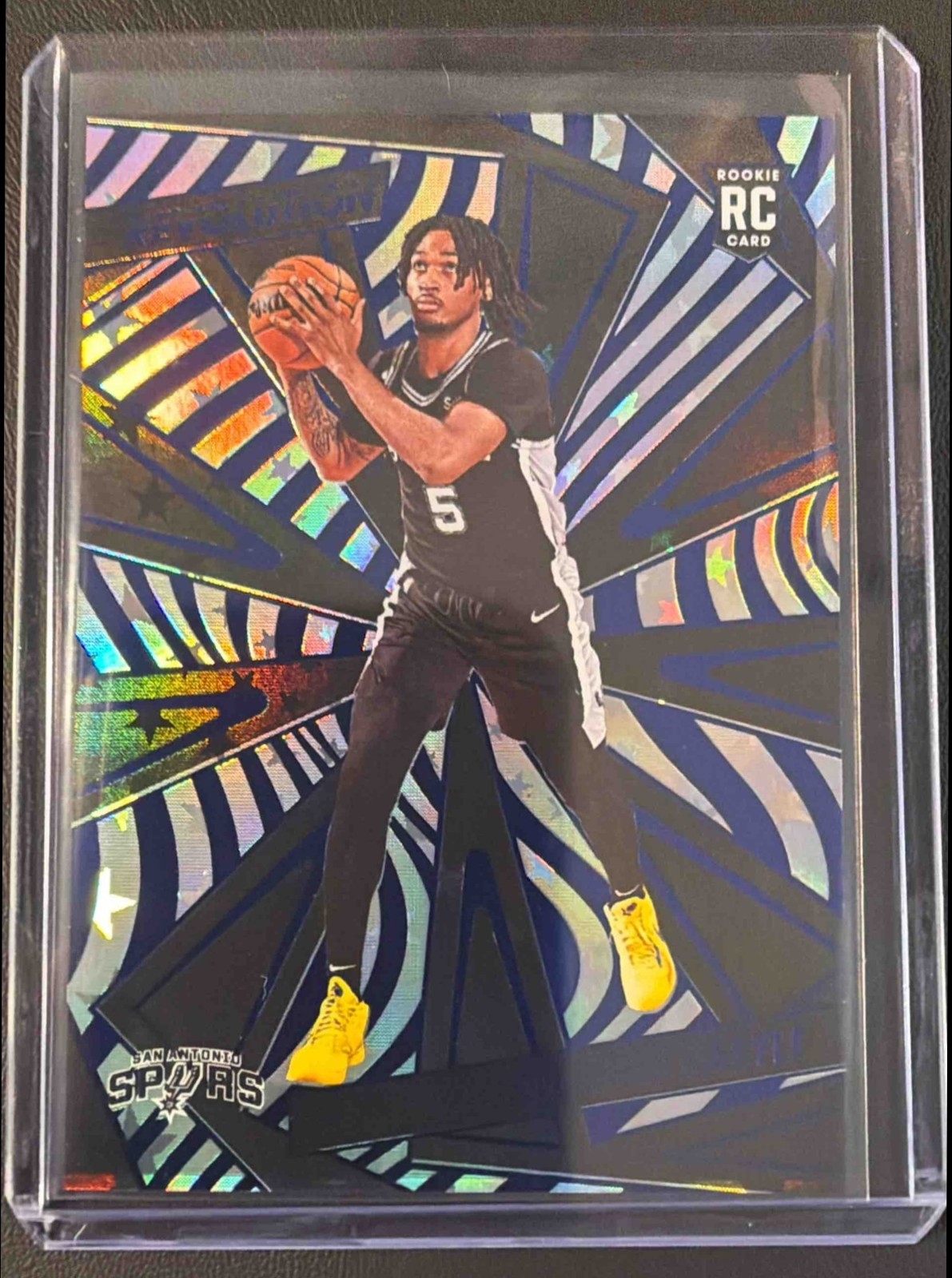 2024-25 Panini Revolution Stephon Castle #116 Blue Astro 2/99 RC Spurs