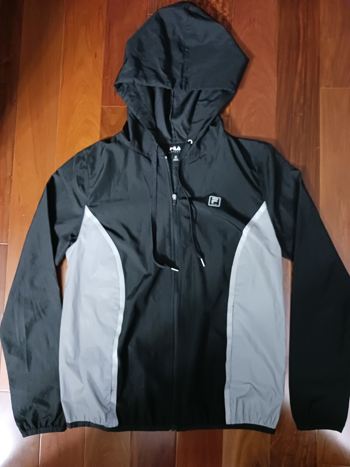 Frangivento adulto XS Fila