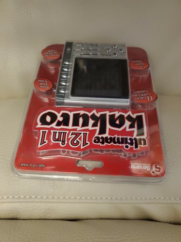 Senario Ultimate 12 in 1 Kakuro Handheld Electronic Game New Sealed. - Picture 3 of 6
