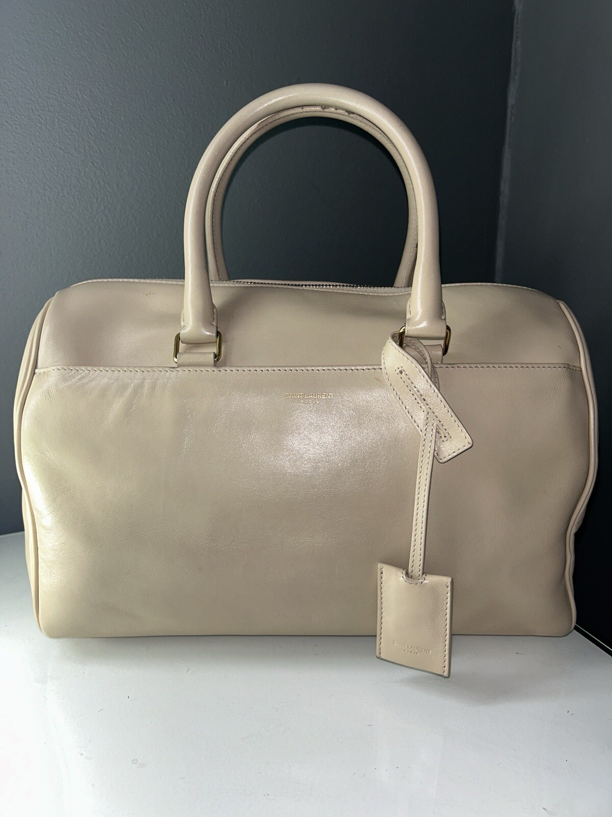 Borsone Saint Laurent Paris vintage interno scamosciato con tracolla e sacchetto antipolvere