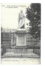 05 GAP STATUE OF THE BARON DE LADOUCETTE AND OLD BARRACKS