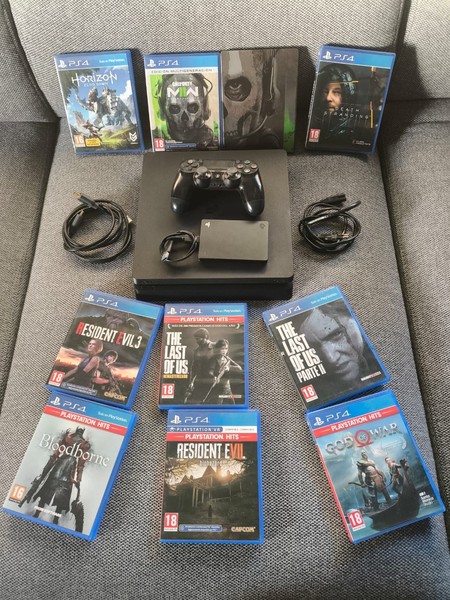 PS4 Slim 500GB + Disco Duro 2TB + 9 Juegos + Mando Original –Todo en buen estado