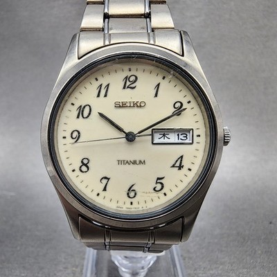 Seiko Watch Men 37mm Luminous Dial Titanium Daydate Round 7N43