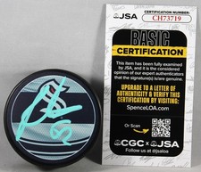 BRANDON MONTOUR SIGNED SEATTLE KRAKEN REVERSE RETRO PUCK AUTOGRAPHED +JSA COA