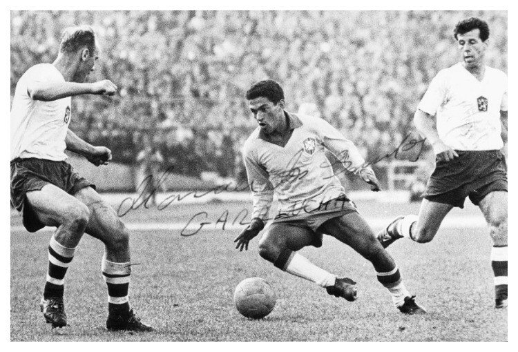 Brazilian football players Pelé and Gilmar signing autographs