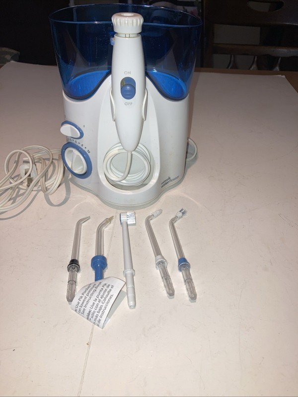 New W/O Pkg Waterpik Water Flosser Model WP-130W