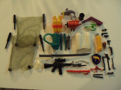 Large Assortment Of Vintage Action Figure Weapons And Accessories ID:92313