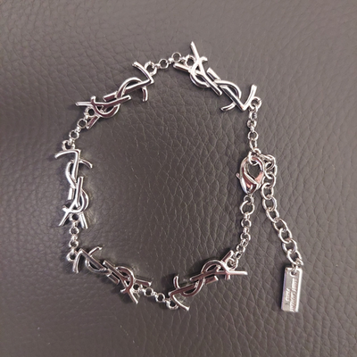 YSL Saint Laurent Silver Tone Logo Charm Bracelet | eBay