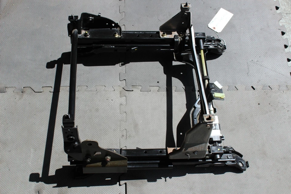 Infiniti FX35 2003-2005 asiento del pasajero delantero derecho riel de vía motor J691 Foto 2 de 4