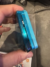Nintendo 3DS Original Aqua Blue Teal System & Super Smash Brothers Game Charger