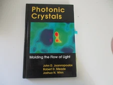 Photonic Crystals: Molding the Flow of Light