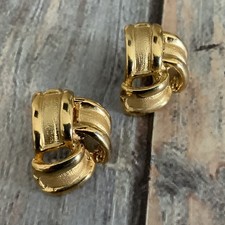 Vintage 80s pierced triangle knot post earrings in gold tone metal