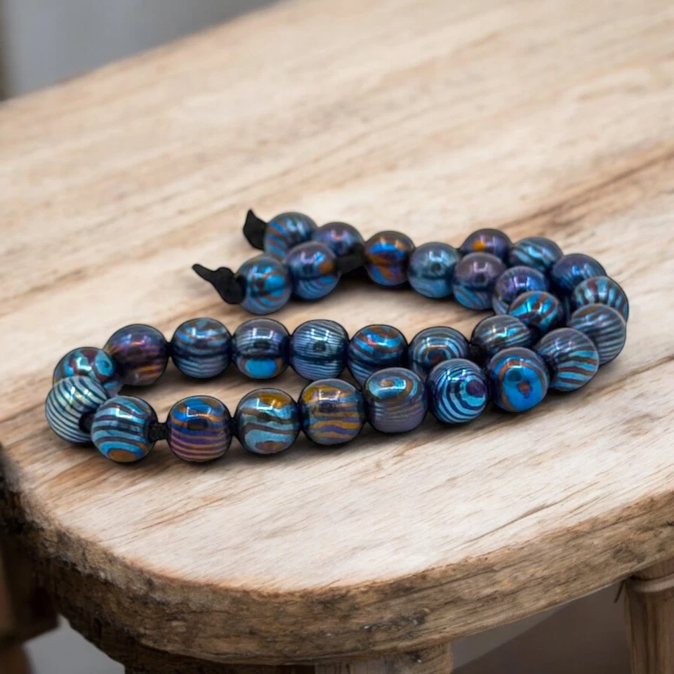 Pulsera hecha a mano con cuentas Timasco forjada a mano joyería Timasco titanio Damasco Foto 2 de 4