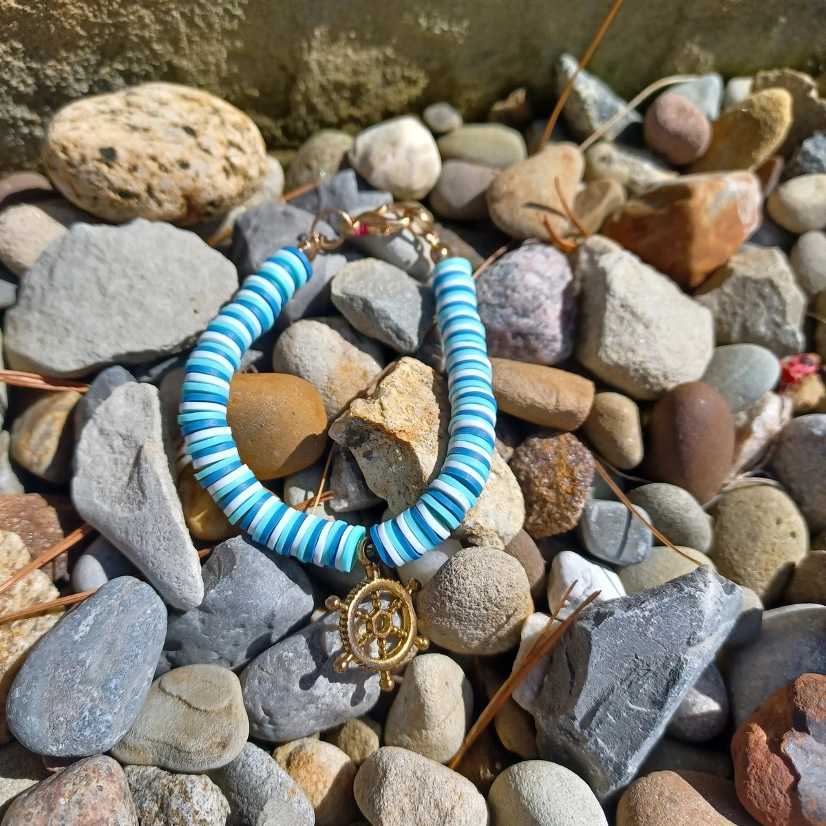 Child's rubber/clay bead bracelet with clasp and nautical charm