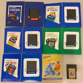 1980s MATTEL INTELLIVISION LOT OF 25 VIDEO GAMES W BOX SOME COMPLETE Q BERT +