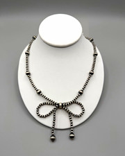 Navajo hand strung machine made sterlings silver pearl bow choker