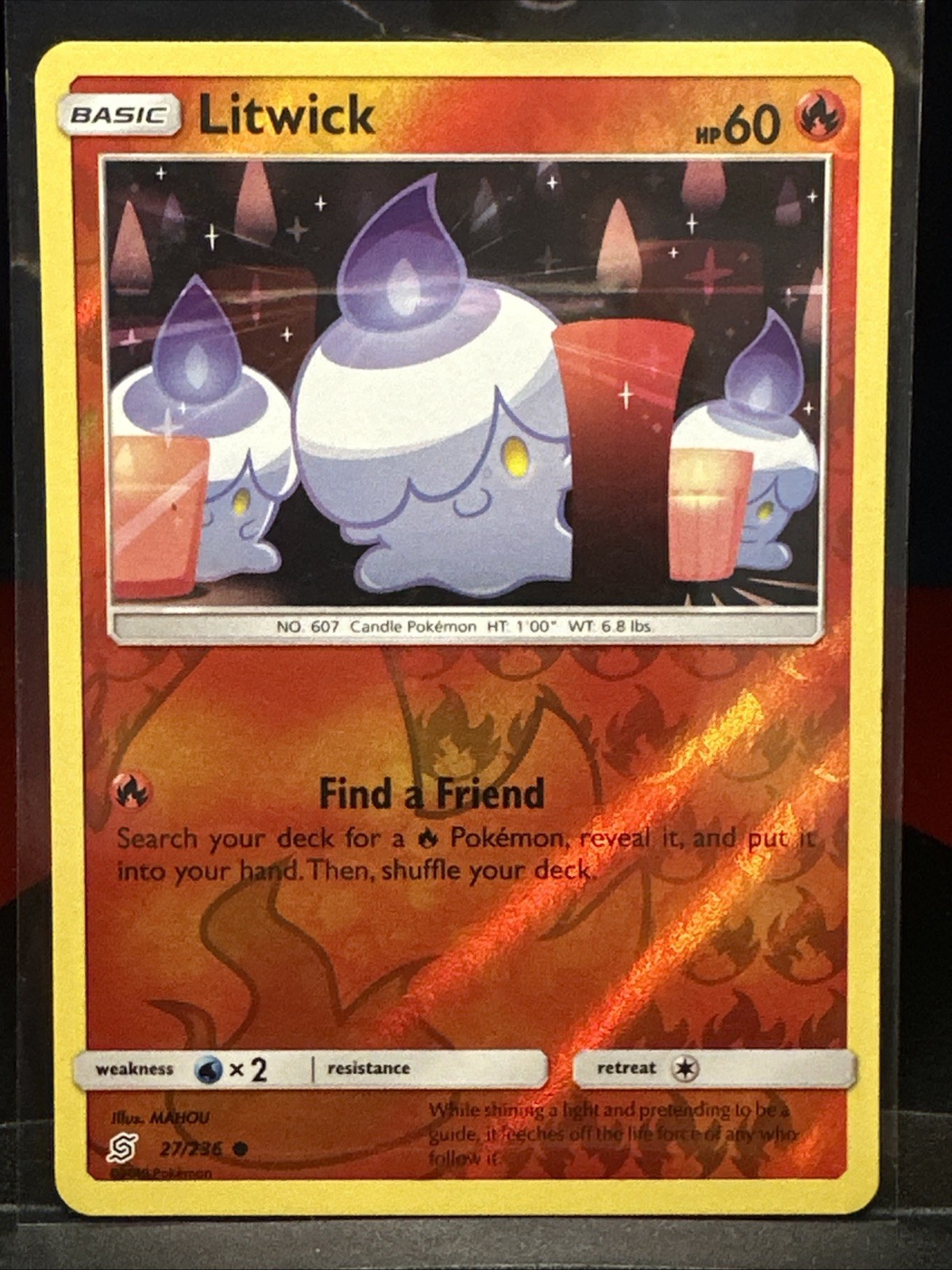 Litwick 27/236 Sm-Unified Minds Reverse Holo