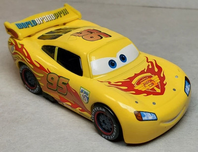 Disney Pixar Cars 2 Yellow WGP Lightning McQueen Diecast 1:55 FC Piston Cup