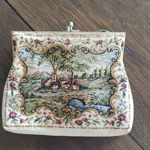 Vintage tapestry purse was made by Delill